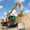 Экскаватор Caterpillar 315 на колесном ходу