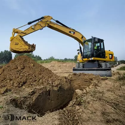 Колесный экскаватор Caterpillar 315